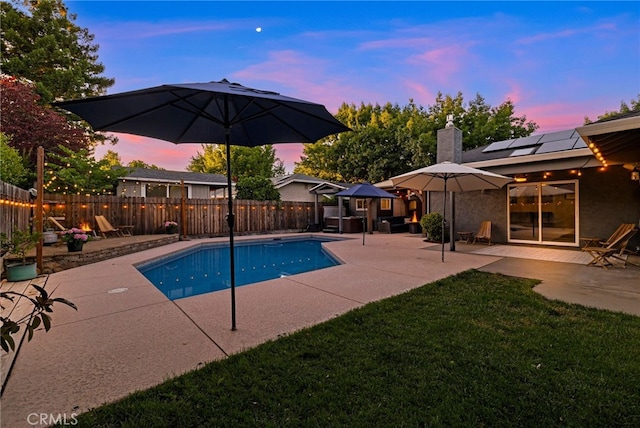 3171 Eagle Lake Ct, Chico, CA 95973 - pool at dusk featuring a patio area