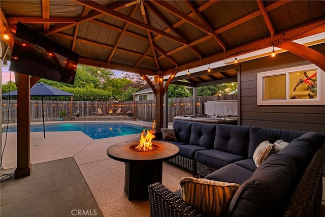 3171 Eagle Lake Ct, Chico, CA 95973 - view of swimming pool with an outdoor living space with a fire pit, a gazebo, a patio area, and a fenced backyard