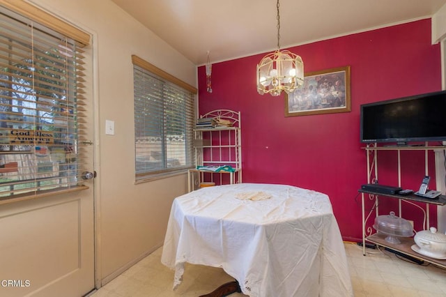 4117 S C St, Oxnard, CA 93033 - dining space with tile patterned floors and a chandelier