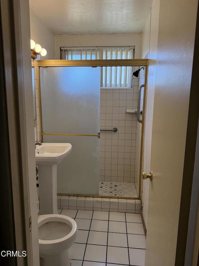 4117 S C St, Oxnard, CA 93033 - full bath with a shower stall and tile patterned flooring
