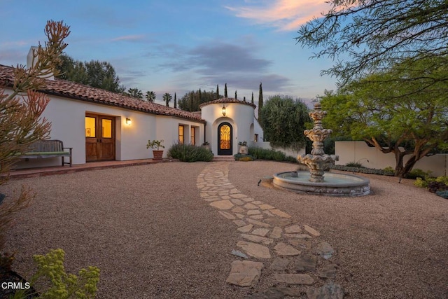10971 Alto Ct, Oak View, CA 93022 - mediterranean / spanish-style house featuring a tiled roof, stucco siding, and french doors