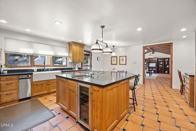 10971 Alto Ct, Oak View, CA 93022 - kitchen featuring wine cooler, a sink, dark countertops, and recessed lighting