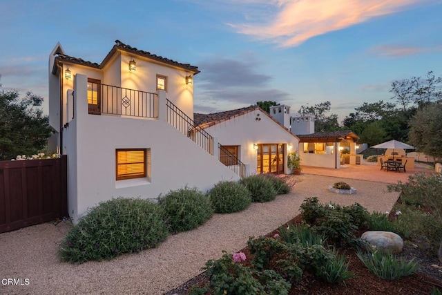 10971 Alto Ct, Oak View, CA 93022 - rear view of house featuring stucco siding, fence, and a patio