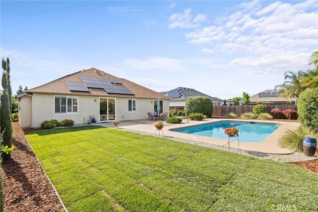 7 Abbott Cir, Chico, CA 95973 - rear view of property with solar panels, a patio area, stucco siding, and a shingled roof