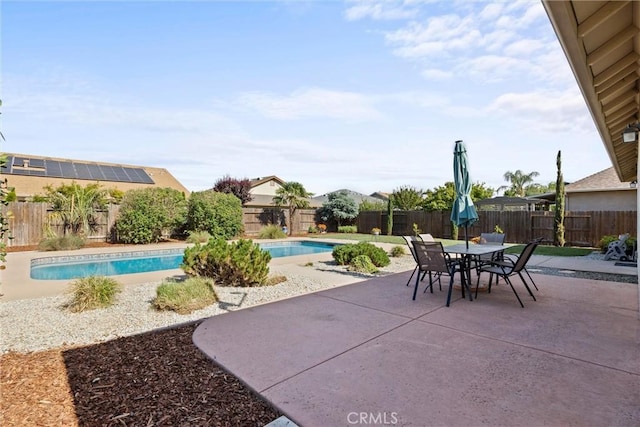 7 Abbott Cir, Chico, CA 95973 - fenced backyard featuring a patio and outdoor dining space