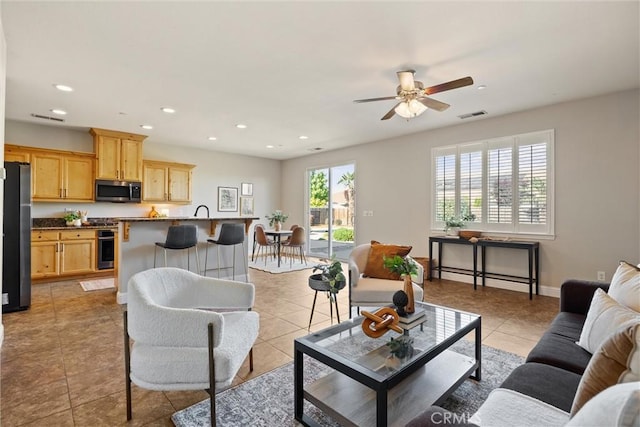 7 Abbott Cir, Chico, CA 95973 - living area featuring recessed lighting, ceiling fan, light tile patterned flooring, and baseboards