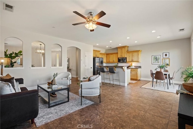 7 Abbott Cir, Chico, CA 95973 - living room featuring arched walkways, ceiling fan, recessed lighting, and baseboards