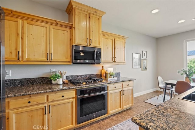 7 Abbott Cir, Chico, CA 95973 - kitchen featuring stainless steel appliances, light brown cabinets, recessed lighting, dark stone counters, and baseboards