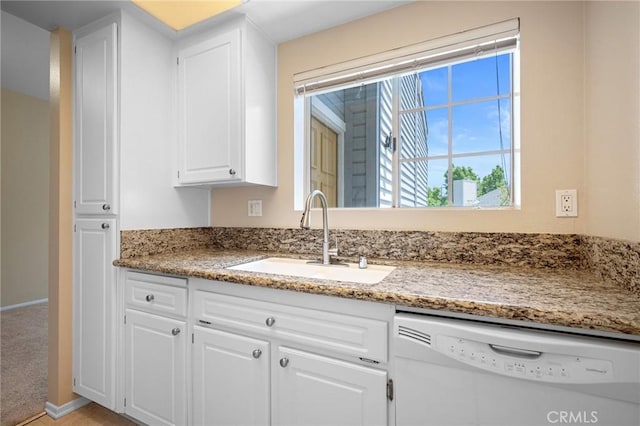 777 S Citrus Ave Unit 266, Azusa, CA 91702 - kitchen featuring white dishwasher, a sink, white cabinets, and light stone counters
