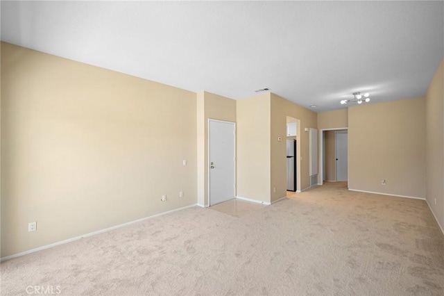777 S Citrus Ave Unit 266, Azusa, CA 91702 - unfurnished room with light colored carpet and baseboards