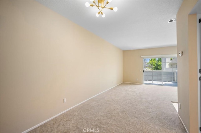 777 S Citrus Ave Unit 266, Azusa, CA 91702 - spare room featuring carpet flooring, a chandelier, and baseboards