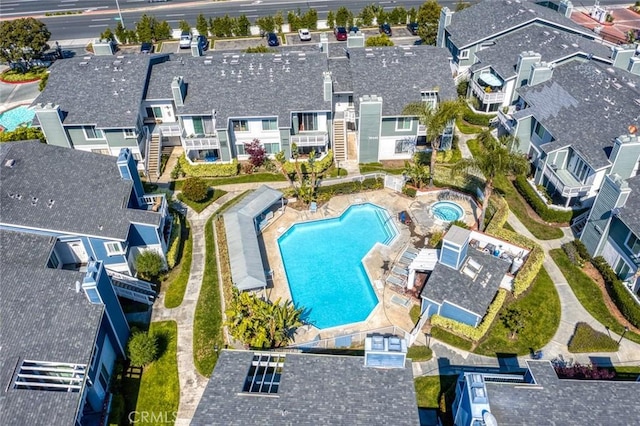 aerial view of residential area with a pool area