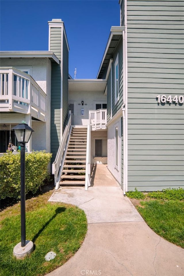 view of building exterior with stairs