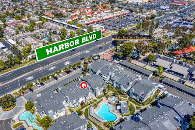 view of property location with a pool area