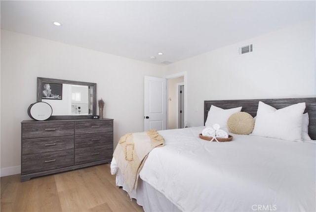 12842 Elizabeth Way, Tustin, CA 92780 - bedroom featuring light wood-type flooring, recessed lighting, and baseboards