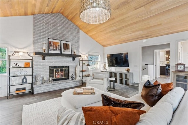 3061 Wood Dr, Cambria, CA 93428 - living room with wooden ceiling, a fireplace, wood finished floors, and high vaulted ceiling