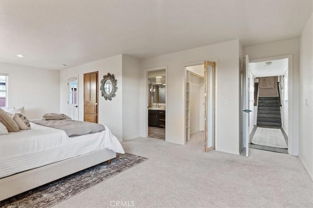 3061 Wood Dr, Cambria, CA 93428 - carpeted bedroom featuring connected bathroom and a walk in closet