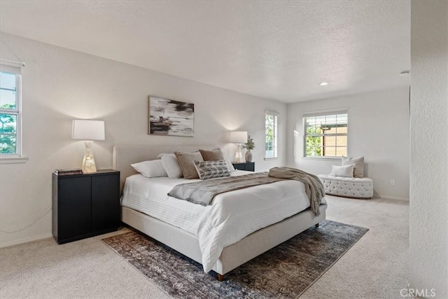 3061 Wood Dr, Cambria, CA 93428 - carpeted bedroom with a textured ceiling and baseboards