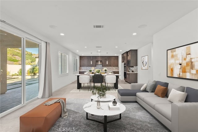 28600 Foothill Way, Saugus, CA 91350 - living room with recessed lighting, light carpet, and baseboards