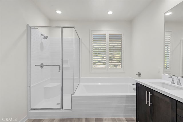 28600 Foothill Way, Saugus, CA 91350 - bathroom with a stall shower, a bath, vanity, healthy amount of natural light, and recessed lighting