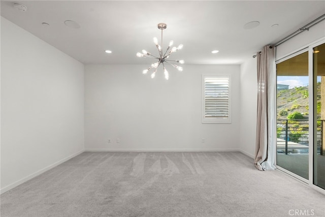 28600 Foothill Way, Saugus, CA 91350 - unfurnished room with a chandelier, light carpet, a smoke detector, baseboards, and recessed lighting