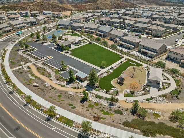 28600 Foothill Way, Saugus, CA 91350 - aerial view of property and surrounding area featuring nearby suburban area and a mountainous background