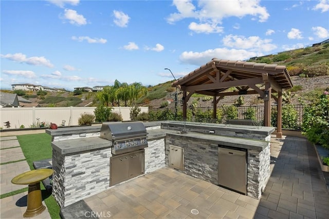 28600 Foothill Way, Saugus, CA 91350 - view of patio featuring a grill, a fenced backyard, a gazebo, and area for grilling