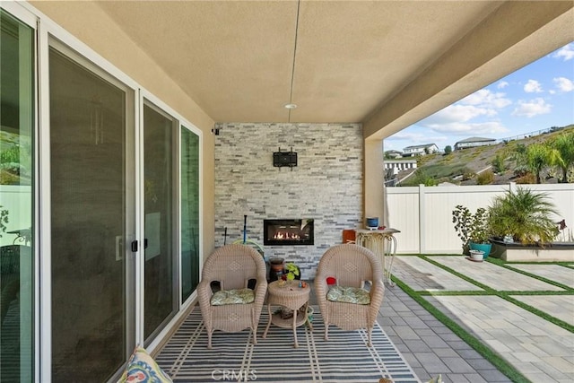 28600 Foothill Way, Saugus, CA 91350 - view of patio featuring fence and an outdoor stone fireplace