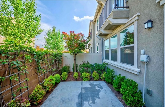1705 Almond Tree Pl, Upland, CA 91784 - fenced backyard featuring a patio and a balcony