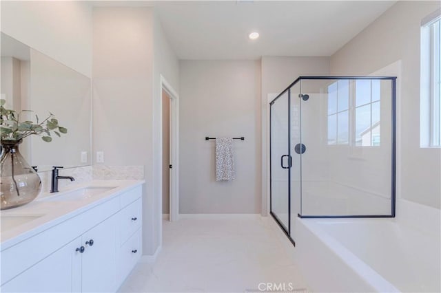 1705 Almond Tree Pl, Upland, CA 91784 - bathroom with a stall shower, double vanity, a bath, baseboards, and marble look tile flooring