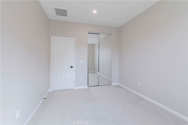 1705 Almond Tree Pl, Upland, CA 91784 - unfurnished bedroom with carpet, baseboards, and a closet