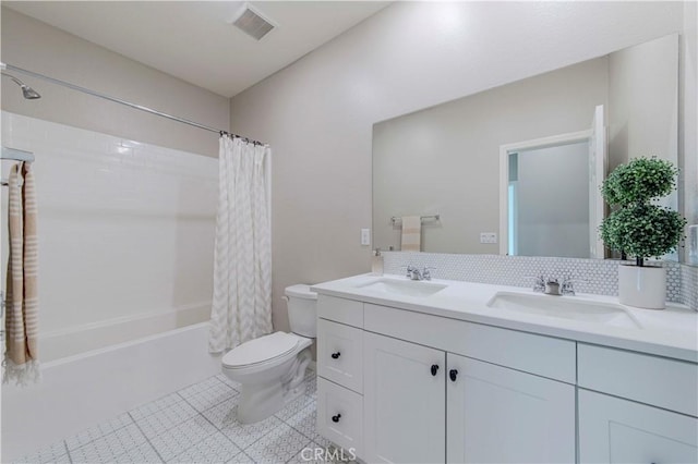 1705 Almond Tree Pl, Upland, CA 91784 - full bath featuring toilet, shower / tub combo, double vanity, and backsplash