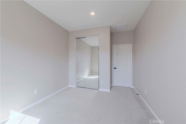 1705 Almond Tree Pl, Upland, CA 91784 - unfurnished bedroom featuring light colored carpet, a closet, baseboards, and recessed lighting
