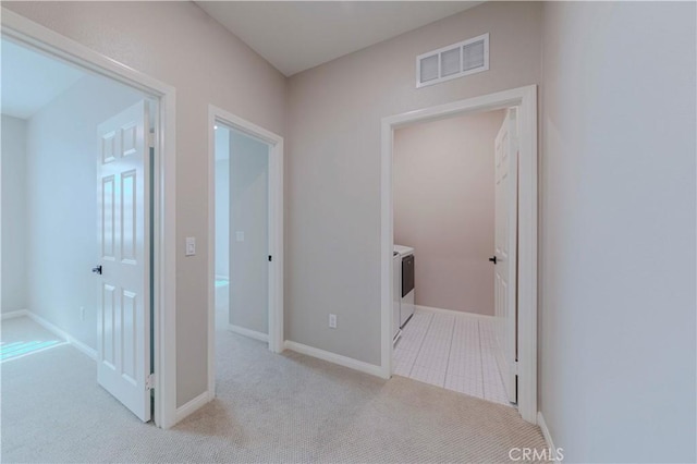 1705 Almond Tree Pl, Upland, CA 91784 - hall with carpet, washer and dryer, and baseboards