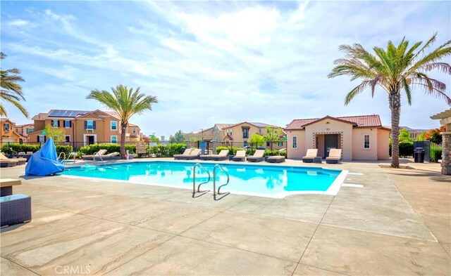 1705 Almond Tree Pl, Upland, CA 91784 - community pool featuring fence, a patio, and a residential view