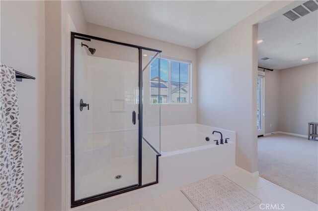 1705 Almond Tree Pl, Upland, CA 91784 - bathroom featuring a stall shower, a bath, and baseboards