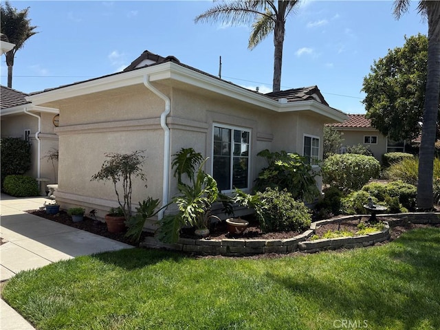 1145 Oakmont Pl, Nipomo, CA 93444 - view of side of property featuring stucco siding and a yard