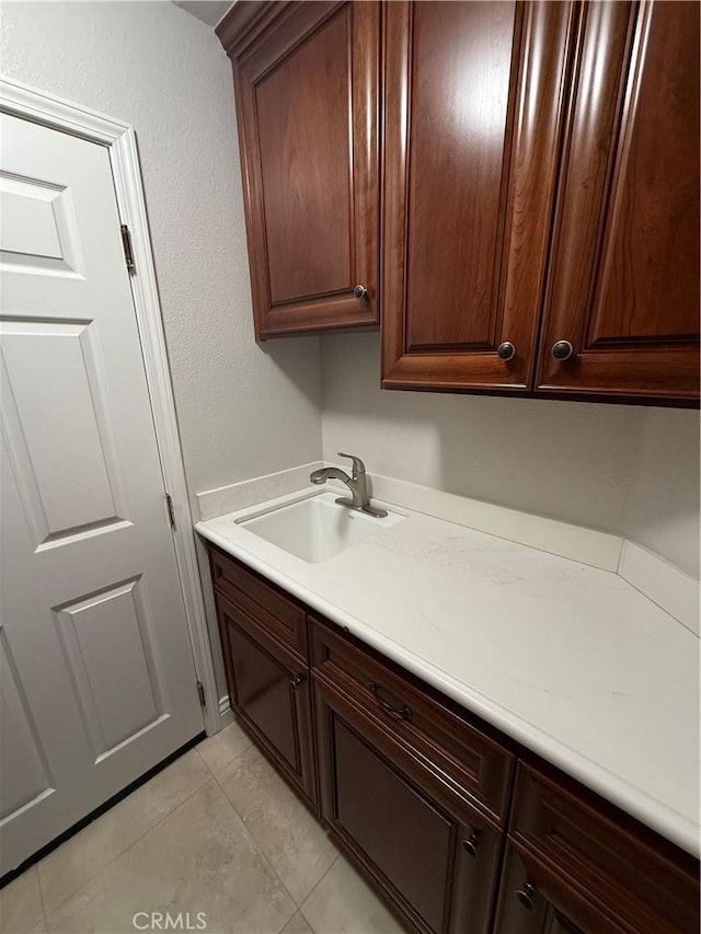 1145 Oakmont Pl, Nipomo, CA 93444 - laundry area with a sink and light tile patterned floors