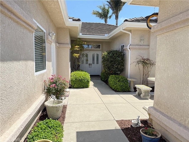 1145 Oakmont Pl, Nipomo, CA 93444 - doorway to property featuring stucco siding, a tiled roof, and a patio