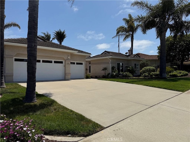 1145 Oakmont Pl, Nipomo, CA 93444 - view of front of property with stucco siding, concrete driveway, a garage, and a tiled roof