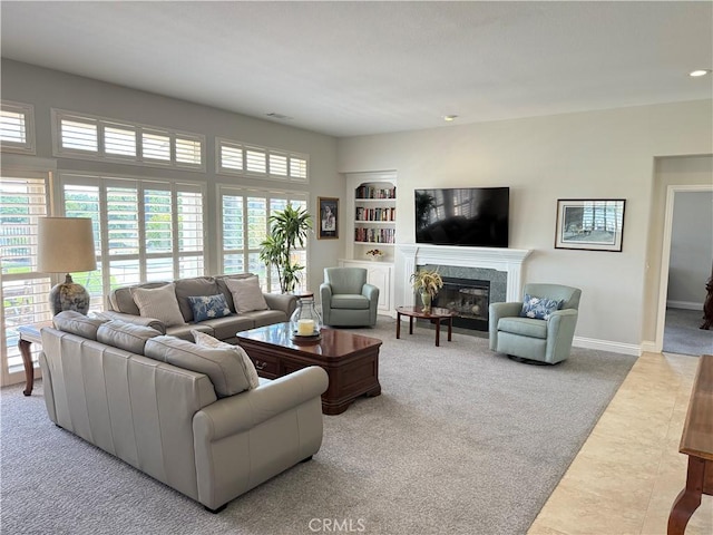 1145 Oakmont Pl, Nipomo, CA 93444 - living area featuring carpet, a fireplace, built in shelves, baseboards, and recessed lighting