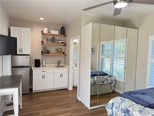1145 Oakmont Pl, Nipomo, CA 93444 - bedroom featuring freestanding refrigerator, a sink, dark wood-style flooring, recessed lighting, and baseboards
