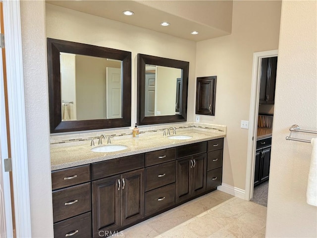 1145 Oakmont Pl, Nipomo, CA 93444 - full bathroom featuring double vanity, recessed lighting, and baseboards