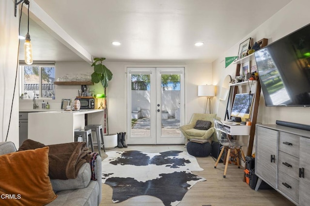 151 W Vince St, Ventura, CA 93001 - living area with french doors, wood finished floors, and recessed lighting