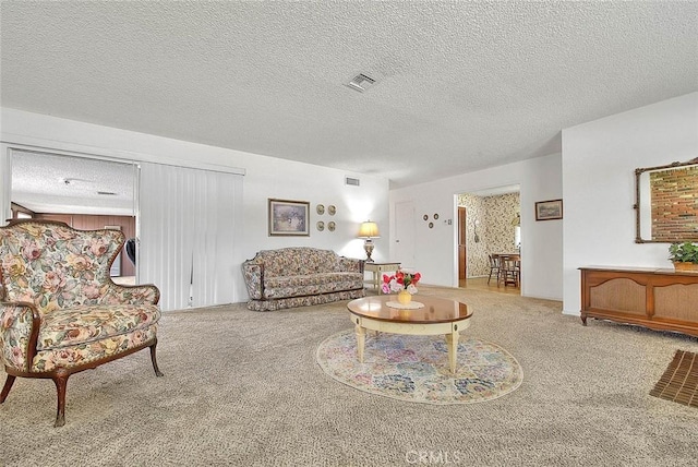 18021 E Cypress St, Covina, CA 91722 - carpeted living area featuring a textured ceiling