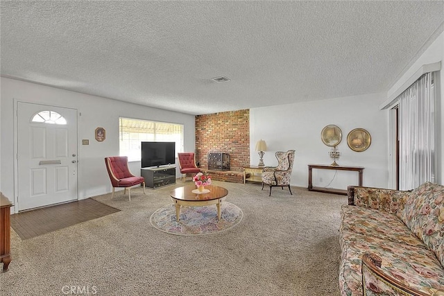 18021 E Cypress St, Covina, CA 91722 - carpeted living area with a textured ceiling