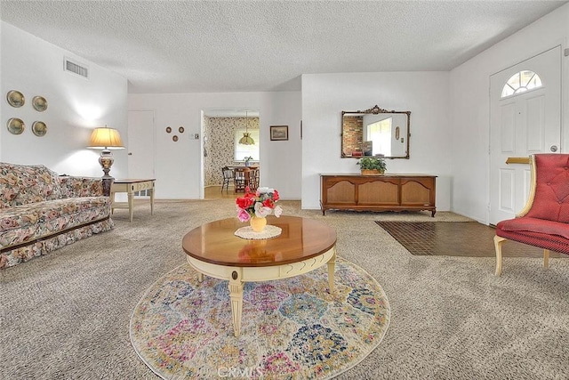 18021 E Cypress St, Covina, CA 91722 - living room with carpet floors and a textured ceiling