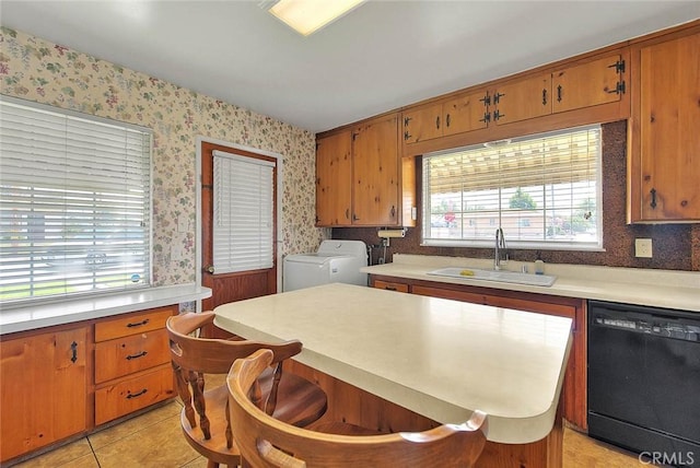 18021 E Cypress St, Covina, CA 91722 - kitchen with dishwasher, a sink, wallpapered walls, washing machine and dryer, and light countertops