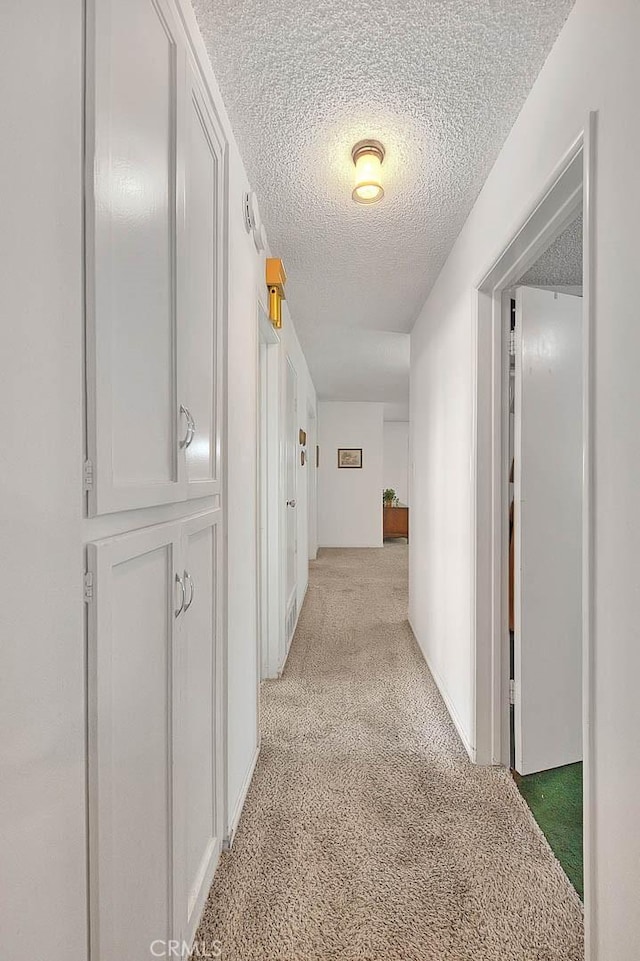 18021 E Cypress St, Covina, CA 91722 - hall with light colored carpet and a textured ceiling
