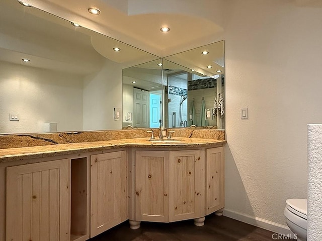 540 Pico Ave Unit 110, San Simeon, CA 93452 - full bath with toilet, wood finished floors, baseboards, recessed lighting, and vanity